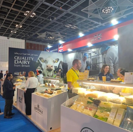 Cheese displays next to a Quality Dairy from Britain sign at Gulfood.