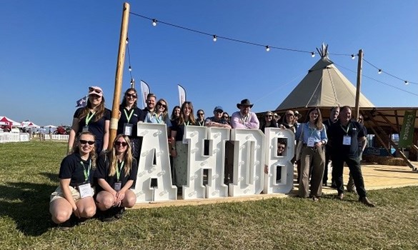 AHDB staff standing around an AHDB sign at Groundswell